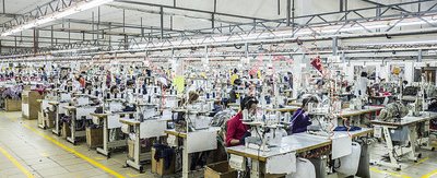 sewing-machine workers in factory