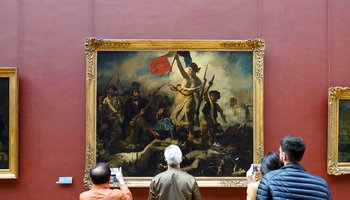 People viewing 'Liberty Leading the People' by Delacroix (Musée du Louvre, Paris)