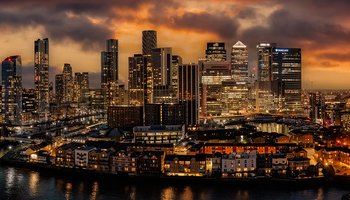 Canary Wharf and London city skyline at dusk. Copyright Adobe Stock
