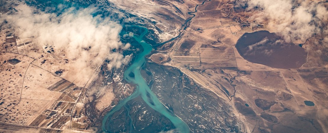 A drone view of Iceland's landscape: river and land