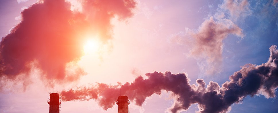 Smoking chimneys of a coal fired power plant