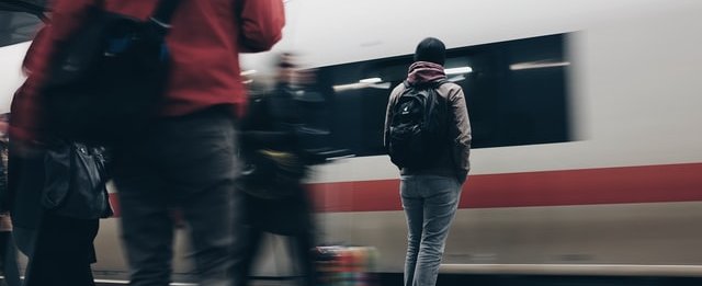 People standing on train platform