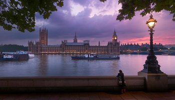 Looking across the River Thames to Westminster at dusk