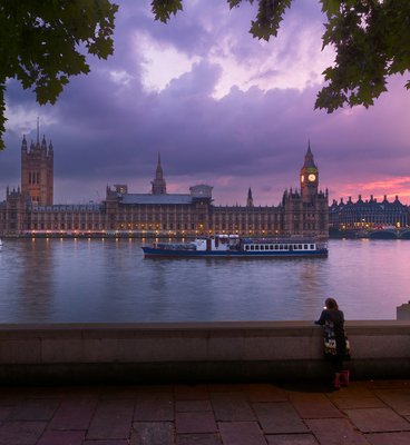 Looking across the River Thames to Westminster at dusk